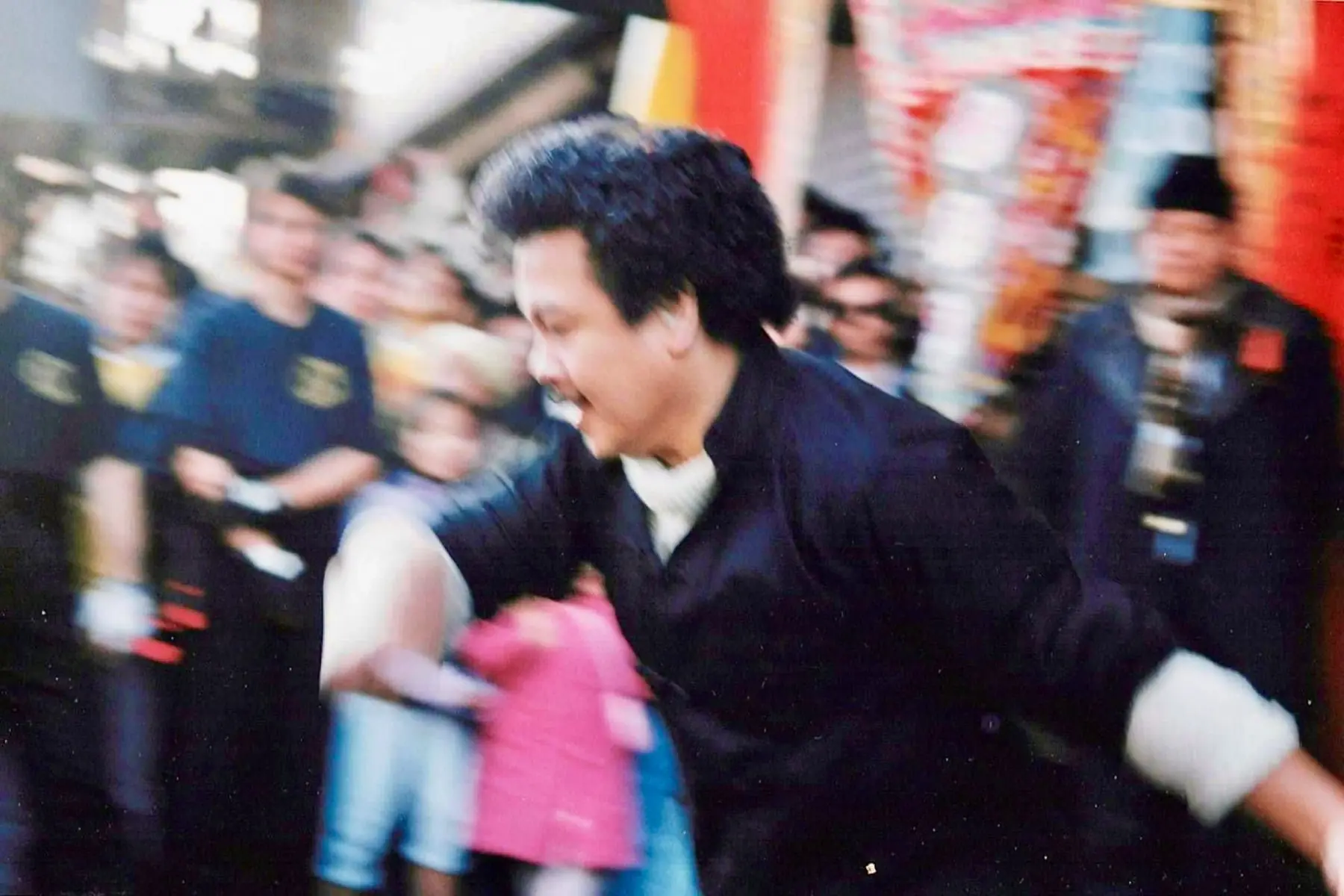 Sifu Tony Lau moving rapidly through a martial arts demonstration