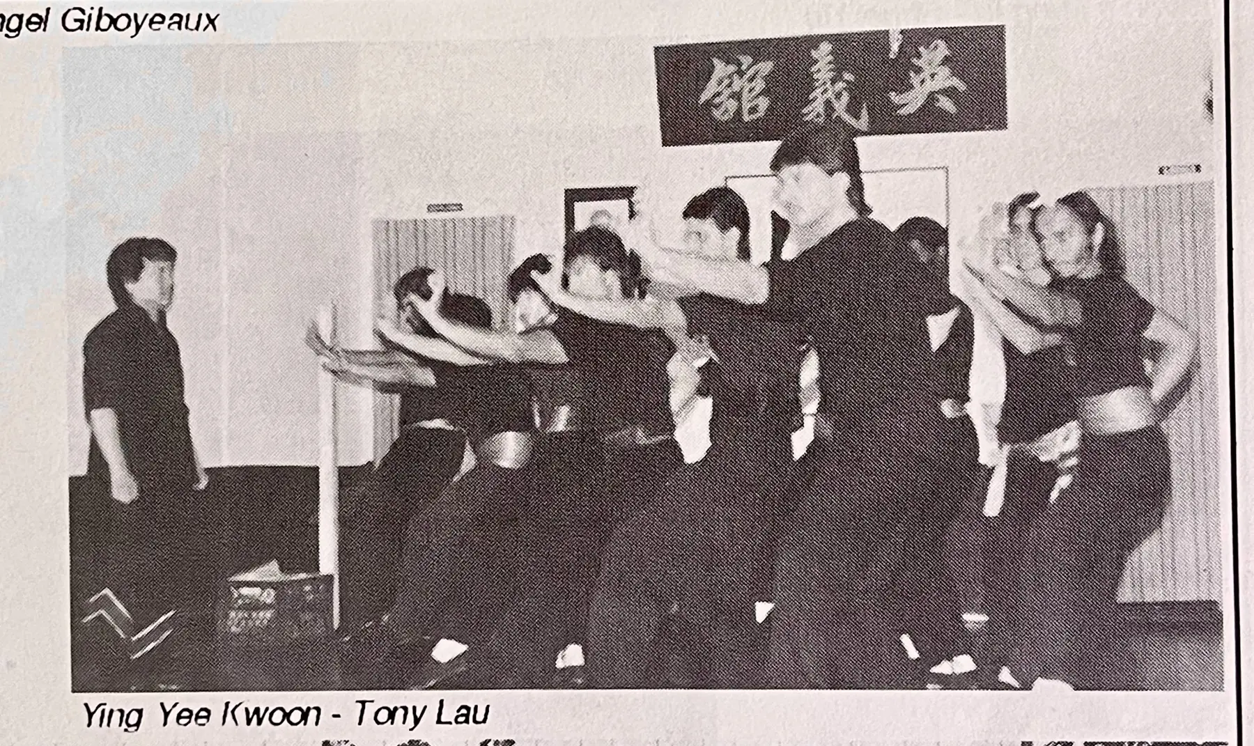 Archival program photograph of Sifu Tony Lau teaching a group at Ying Yee Kwoon